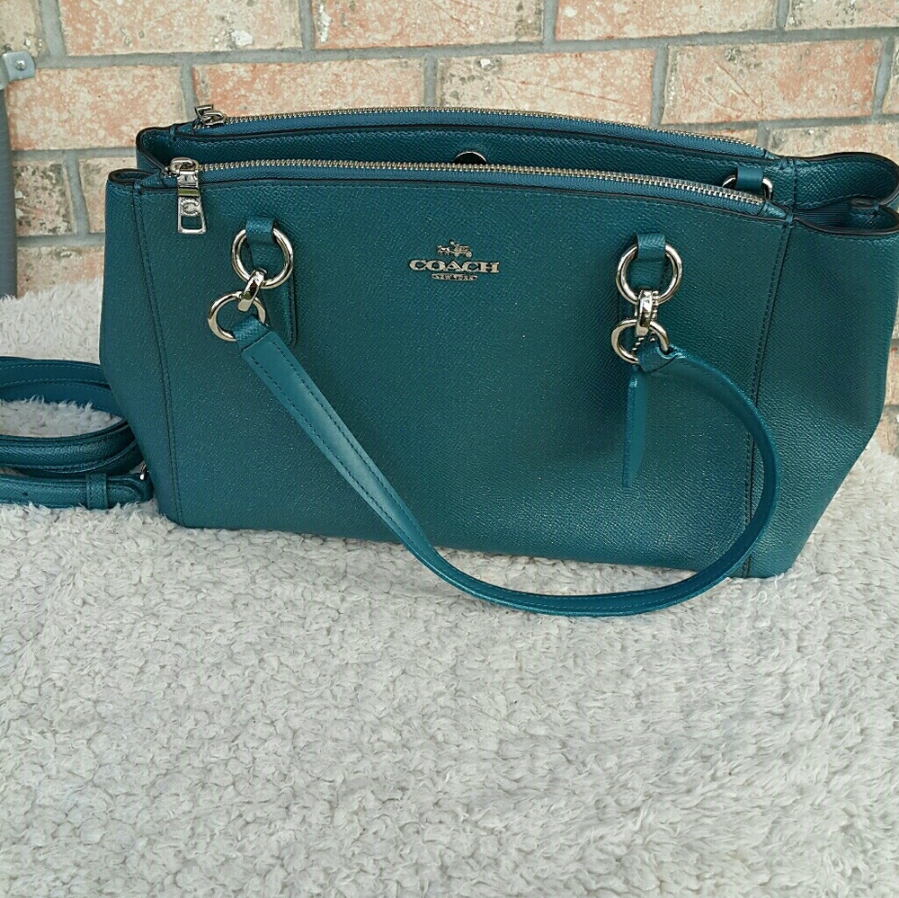Teal coach purse with wallet- never used, no tags